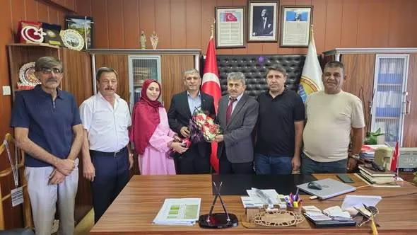 MHP Çumra İlçe Başkanı Ercan Ateş’ten Milli Eğitim Müdürü Altunyaldız’a Ziyaret