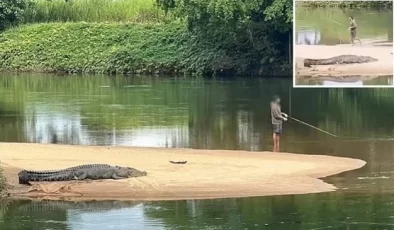 Dev timsaha aldırmadan balık tutmaya devam eden Avustralyalı adam tepki gördü